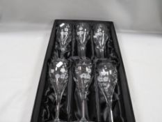 A boxed set of Royal Doulton wine glasses