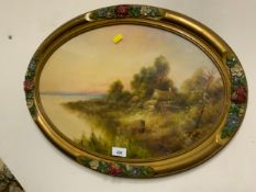 An oval oil painting of a River landscape with a figure by the bank
