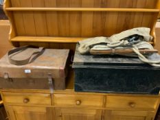 A vintage leather covered tin trunk addressed to M Lambart together with another tin trunk etc.