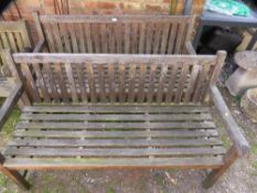 Two modern hardwood matching garden benches