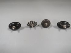 Four hallmarked silver tea and coffee pot knobs