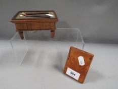 A novelty inkwell and stamp holder in the form of a billiard table together with a treen card case