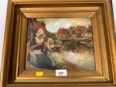 An naïve oil on canvas depicting two Dutch girls beside a canal