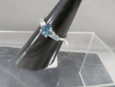 A hallmarked 9 carat white gold blue topaz ring approx. weight 2.3g
