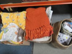 Three boxes of soft furnishings and ex show home decorative items