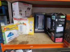 A selection of boxed electrical items to include dehumidifier, iron, Tefal toaster etc - house