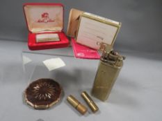 Four vintage lighters, a powder compact and military jack knife