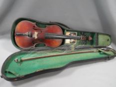 A cased vintage violin and bow with etched detailing
