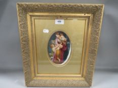 A gilt framed hand-painted ceramic panel