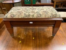 An antique mahogany upholstered stool with brass capping L 80 cm