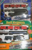 TWO LARGE BOXED BATTERY OPERATED TRAINSETS, to include Universe of Classic Train International