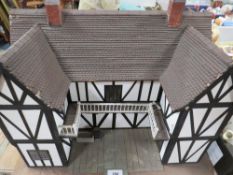 A vintage handmade wooden dolls house