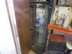 A modern glass display unit with shelves