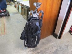 A set of golf clubs to include Dunlop and vintage clubs