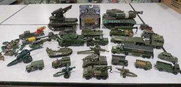 A LARGE COLLECTION OF MIXED SCALE MILITARY VEHICLES, all unboxed, by Dinky, Matchbox etc., to