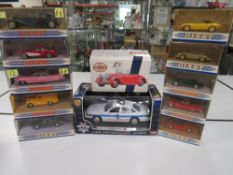 ELEVEN BOXED DINKY CARS AND VANS, to include 1939 Triumph Dolomite, 1959 pink Cadillac etc.,