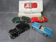 A BOXED FRANKLIN MINT FORD THUNDERBIRD, together with four unboxed 1:18 cars to include Maitso