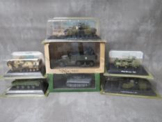 SEVEN BOXED / CARDED MILITARY VEHICLES, to include Atlas mutiple fun motor carriage 16, 1944 Tiger
