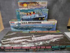 FOUR SHIPS MODEL KITS, to include Aurora USS Enterprise aircraft carrier with instructions and