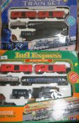 TWO LARGE BOXED BATTERY OPERATED TRAINSETS, to include Universe of Classic Train International