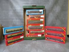 TWELVE BOXED AIRFIX AND HORNBY 00 GAUGE TRAIN CARRAIGES