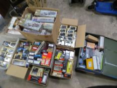 A large selection of model cars / trains display point of sale boxes