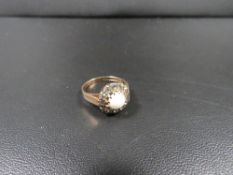 A hallmarked 9 carat gold opal and diamond cluster ring approx. weight 2.1g ring size I