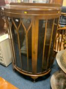 An oak vintage Demi-lune china cabinet together with two prints