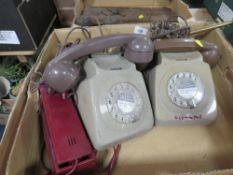 A tray of vintage telephones etc