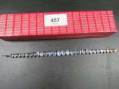 A moonstone bracelet with gilt metal