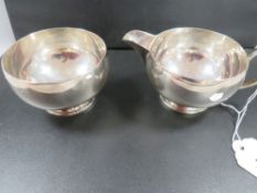 A hallmarked silver cream jug and sugar bowl approx. combined weight 213.7g