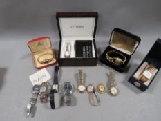 A tray of assorted wrist watches