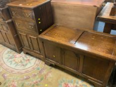 A vintage oak blanket box together a small oak cabinet