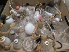 A tray of assorted perfume bottles/sprays to include cut glass, china, etc.