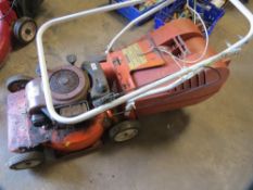 A Flymo petrol lawn mower