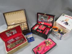 A tray of assorted collectable coin sets