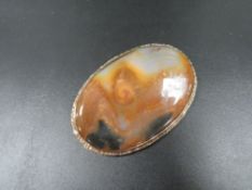A large antique agate brooch in yellow metal mount