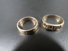 A hallmarked 9 carat gold band approx. weight 2.8g together with a Greek key design ring stamped 585