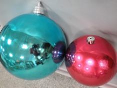 Two large oversized Christmas decorations