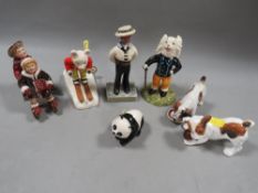 Seven assorted figures to include Royal Doulton 