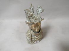 An African Benin style brass head and shoulders model of a tribal 'King' / figure