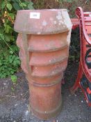 A terracotta chimney pot planter