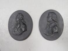 Two Wedgwood style basalt plaques of Nelson and Josiah Wedgwood