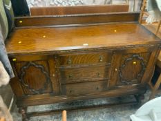 A heavy oak 20th century sideboard W 156 cm