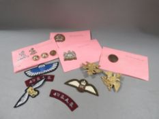 A quantity of military badges