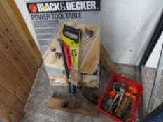 A boxed Black and Decker power tool table together with a tray of tools