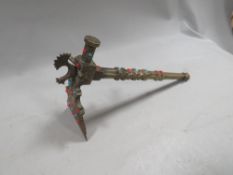 A bronze gemset tribal style ice axe?
