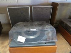 A Garrard record player deck with speakers