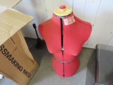 A boxed vintage dress making dummy