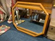 A large modern wooden and wicker wall mirror W 122 cm